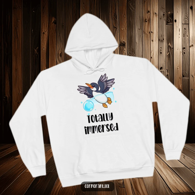 Funny cormorant hoodie showcasing a cormorant with wide-spread wings playfully diving into a sparkling blue bubble, symbolizing aquatic fun and freedom.