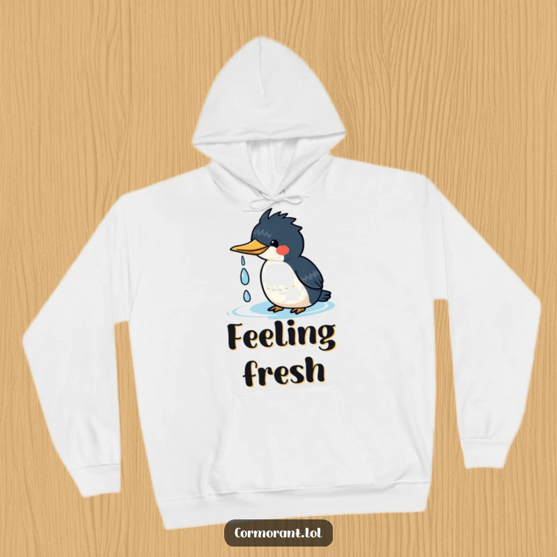 Funny kawaii cormorant hoodie featuring a cute bird happily shaking water droplets off its head, perfect for cozy joy.