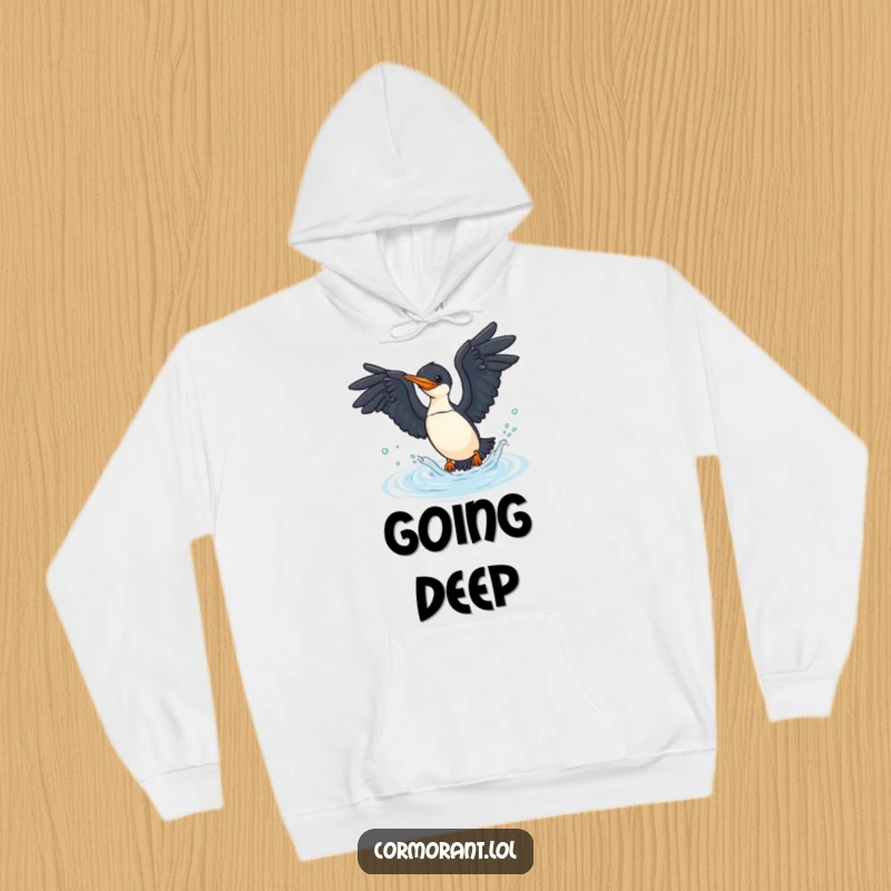 Funny cormorant hoodie showing a bird diving into water, embodying aquatic action and cozy humor.