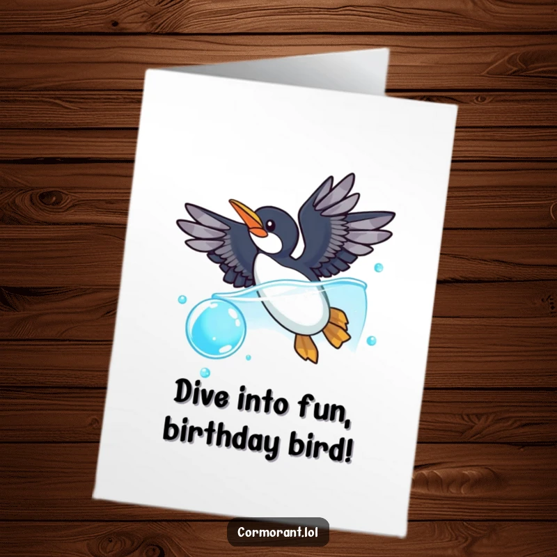 Funny Free Printable Birthday Card: A cormorant with wings spread dives playfully into a sparkling blue bubble, wishing a happy birthday.