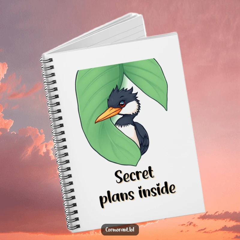 Funny Cormorant Notebook: A journal featuring a funny cormorant peeking curiously from behind a large, wet leaf, ready for your notes.