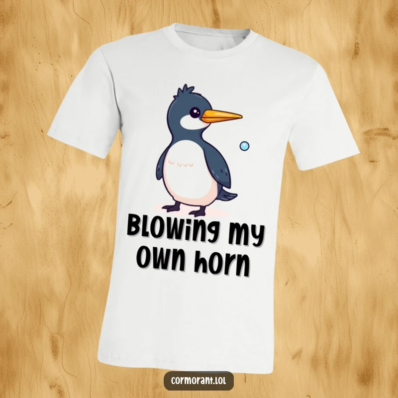 Funny Cormorant T-Shirt showcasing a whimsical bird with a small bubble trailing behind it, perfect for playful personalities.