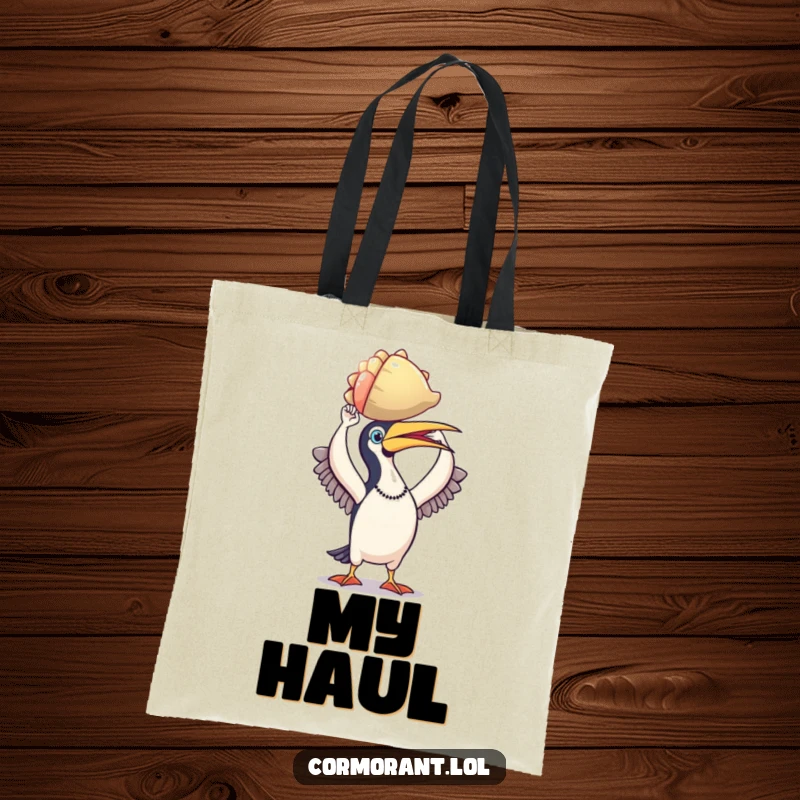 Funny cormorant tote bag, triumphant bird holding a shiny, colorful shell, perfect for beach trips and carrying collected treasures.